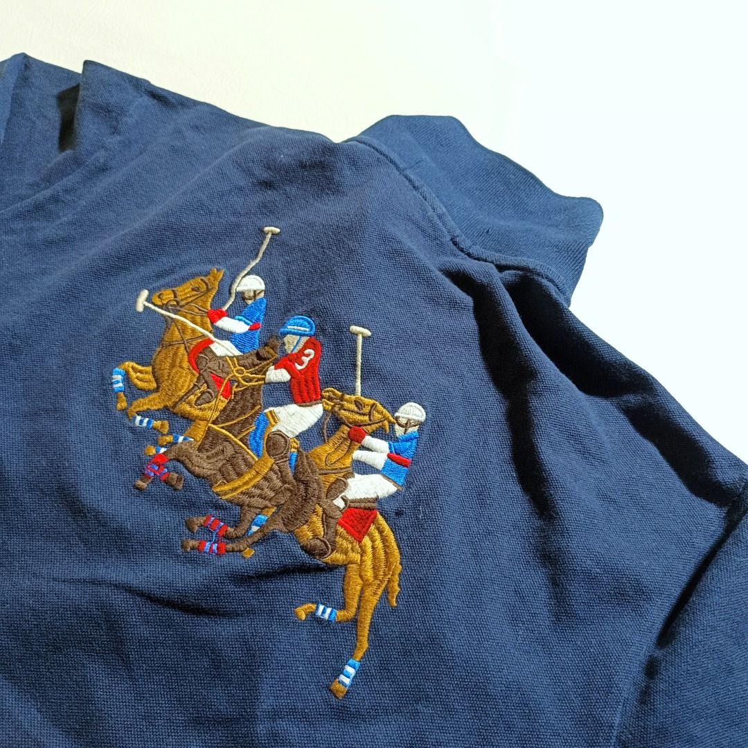 Ralph Lauren Navy Blue Poloshirt (Category: Activewear) located in Baguio. Submitted by freshmarket_2600 (Listing ID 1436663944, Image 2). Description: Brand: Ralph Lauren Tags: Complete Size: Med Dimension: L26W20.5 Condition: Excellent Color rate: 10/10 Color: Navy blue Issue/s: None.