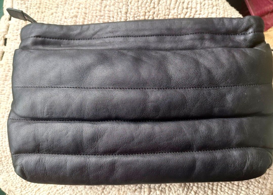 Rouge and lounge RL Clutch Bag (Category: Clutches) located in Dipolog. Submitted by snegrej10 (Listing ID 1436651133, Image 2). Description: - clutch bag. pwede i sling bag. - Quilted design - Leather exterior - Patterned lining - no issue - black in actual - Small interior pocket - Magnetic closure - Stylish accessory.