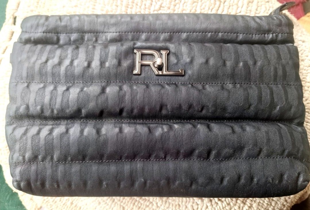 Rouge and lounge RL Clutch Bag (Category: Clutches) located in Dipolog. Submitted by snegrej10 (Listing ID 1436651133, Image 1). Description: - clutch bag. pwede i sling bag. - Quilted design - Leather exterior - Patterned lining - no issue - black in actual - Small interior pocket - Magnetic closure - Stylish accessory.