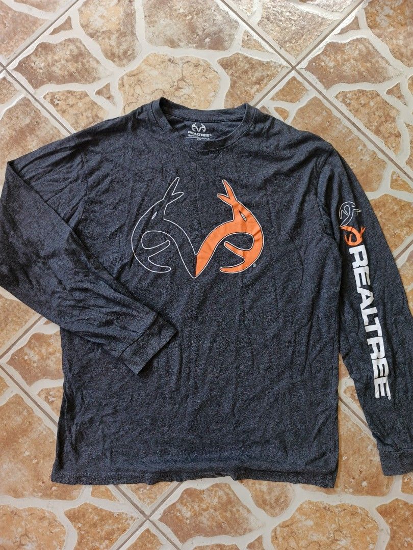 Real Tree Sleeve (Category: Activewear) located in Maasin. Submitted by deggsthrifz (Listing ID 1436784193, Image 1). Description: Good condition No major flaws/issues Large on tag.