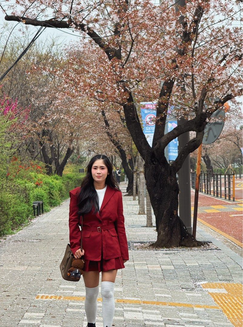 Red Blazer and Skirt Set (Category: Sets or Coordinates) located in Cavite. Submitted by jksnoonacart (Listing ID 1436825651, Image 1). Description: - Red blazer and mini skirt set - Blazer features a tailored fit with a belt - Matching tennis skirt - Perfect for a chic, coordinated look - Versatile for various occasions - With shoulder pads - Perfect for concert outfits.