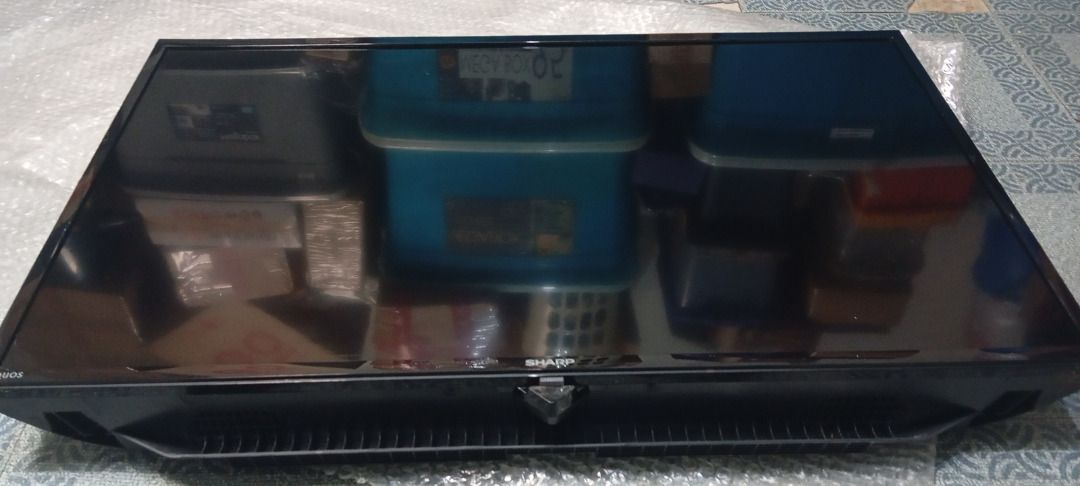 Sharp Aquos 32" | 2T-C32CB1M | Basic TV (pre-owned) (Category: TV) located in Marikina City. Submitted by leoricktechservices (Listing ID 1436692466, Image 3). Description: Sharp Aquos 32" | 2T-C32CB1M | Basic TV (pre-owned) Condition: Used but in good condition. RFS: It belonged to my late mother and hasn't been used in a year. Disposing everything not in use. Honest Issue: I don't know why my mother used masking tape all around the edge which l