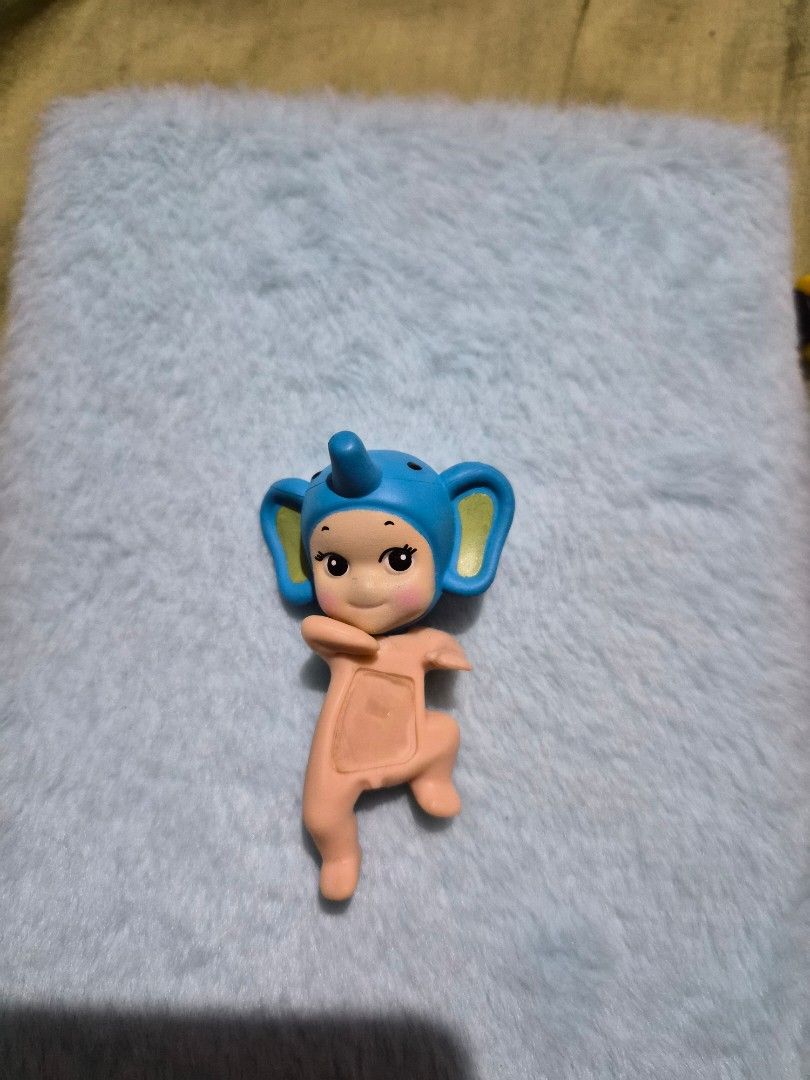 Sonny Angel Elephant Hipper from Looking Back Series (Category: Designer & Blind Box Toys) located in Mandaue City. Submitted by chuchi152615 (Listing ID 1436672696, Image 2). Description: This collectible mini figure is designed with adhesive tape to be attached to flat surfaces like phones or laptops. Material: PVC.