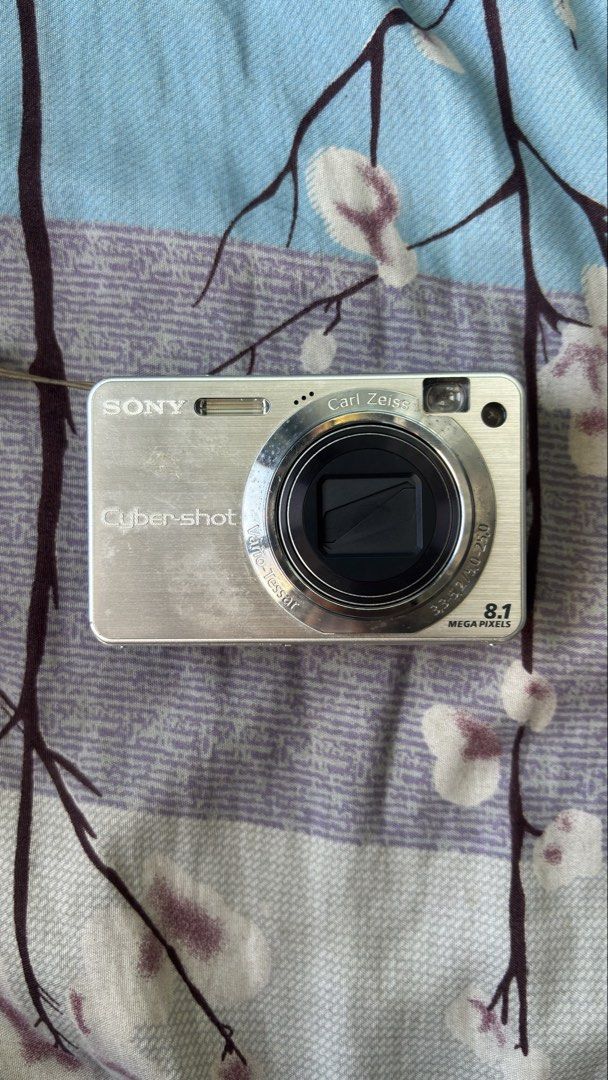 Sony Cyber-shot DSC-W150 Digital Camera (Category: Cameras) located in Imus. Submitted by keyraaazay (Listing ID 1436667181, Image 1). Description: - Sony Cyber-shot DSC-W150 - Carl Zeiss lens - 8.1 megapixels - Super SteadyShot - Silver finish - Includes wrist strap - Screen on the back - Model: DSC-W150 -Haven’t been tested if working, pero pina diagnose and battery lang daw po need. .