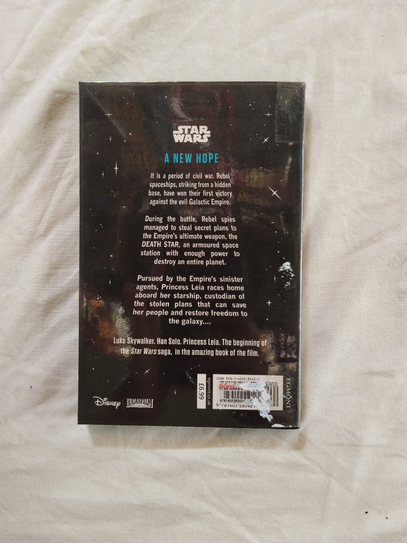 Star Wars A New Hope Ryder Windham (Paperback) | Sci-fi, Science fiction (Category: Storybooks) located in Manila. Submitted by ubes_corner (Listing ID 1436699850, Image 3). Description: Star Wars A New Hope Ryder Windham (Paperback) Condition of the Book: 🪻With plastic cover 🪻Only one writing in the front page (name) 🪻Bought in 2019 kaya merong yellow stains sa mga pages sa kalumaan 🪻Small defects, stain, and creases sa cover.