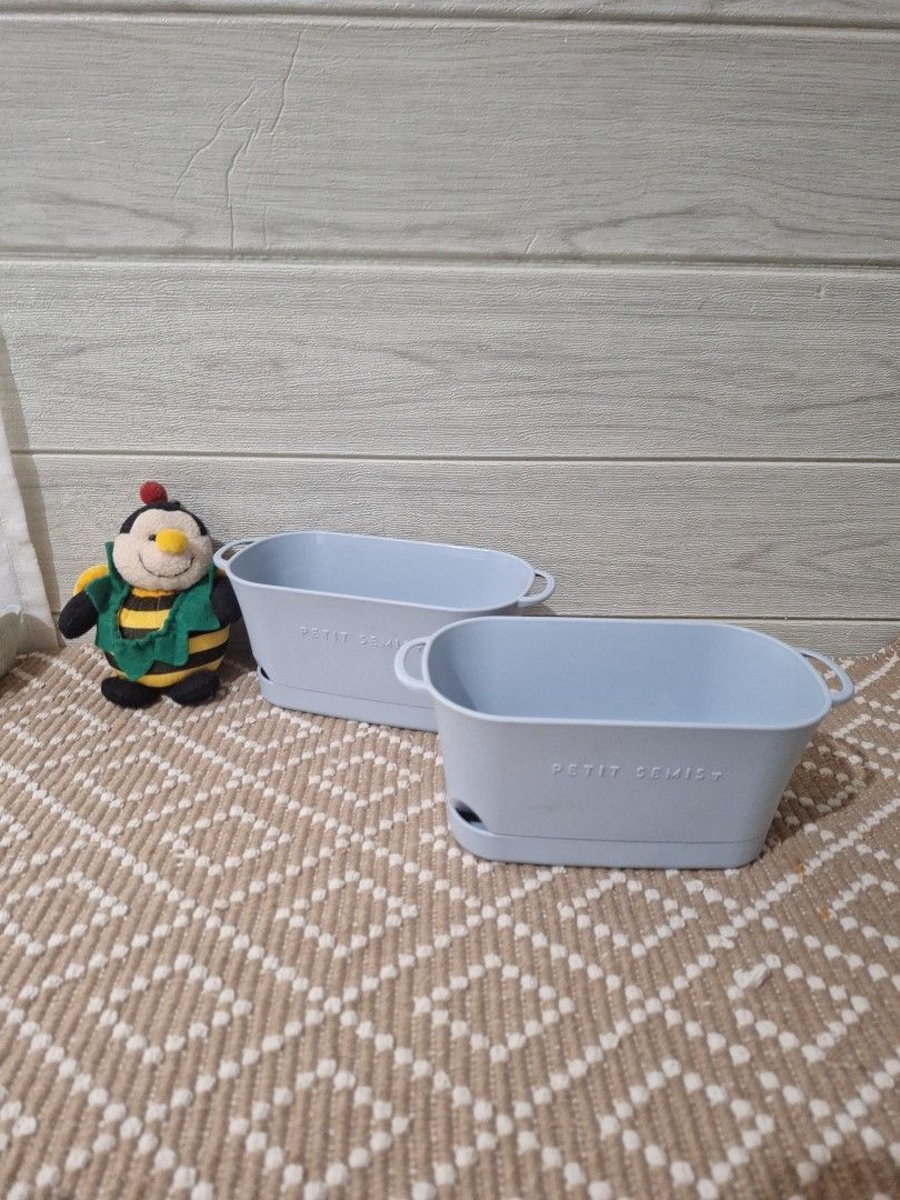 Take All DAISO Blue Long Pots (Category: Storage Boxes & Baskets) located in Legazpi City. Submitted by bellebargainbox (Listing ID 1436665029, Image 1). Description: - Set of three light blue pots for your indoor plants - Each basket includes a handle. - Slightly curved shape. - Stackable design for space-saving storage. - Ideal for organizing small items. - Baskets are clean and ready for immediate use..