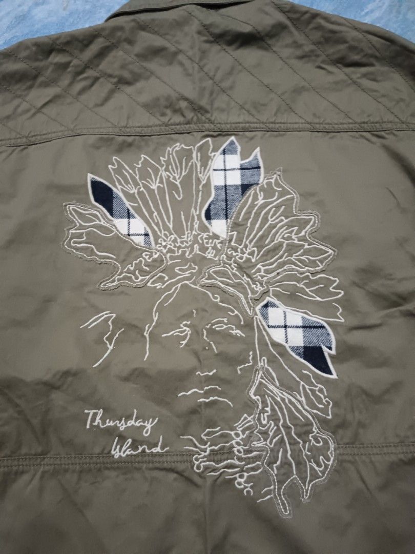 Thursday Island Jacket (Category: Coats, Jackets and Outerwear) located in Kota Kinabalu. Submitted by omenthrift (Listing ID 1436766511, Image 3). Description: - Thursday Island jacket -Size Pit 19.5 / L 26 - Olive green color - Native American design on the back - Two chest pockets - Size 85(S).