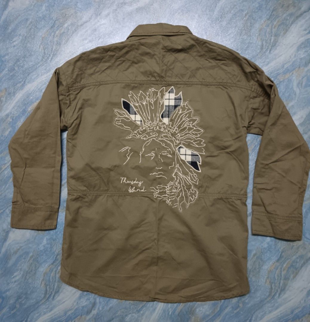 Thursday Island Jacket (Category: Coats, Jackets and Outerwear) located in Kota Kinabalu. Submitted by omenthrift (Listing ID 1436766511, Image 1). Description: - Thursday Island jacket -Size Pit 19.5 / L 26 - Olive green color - Native American design on the back - Two chest pockets - Size 85(S).