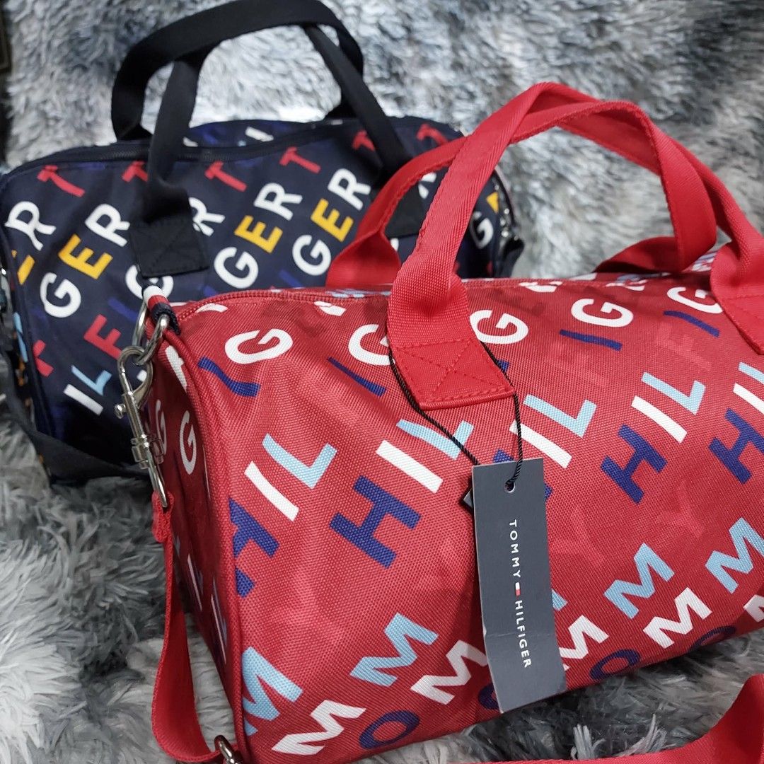Tommy Hilfiger Duffle Bag (Category: Cross-body Bags) located in Manila. Submitted by rnegosa1522 (Listing ID 1436670980, Image 1). Description: Blue sold. Only RED available. ORIGINAL Brand new with tag MOP: GCash MOD: J&T, LBC, Lalamove.