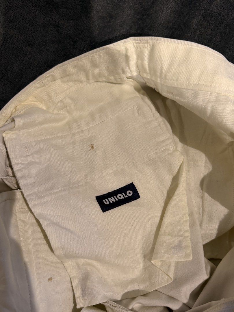 Uniqlo Casual Pleated Pants (Category: Trousers) located in Las Pinas. Submitted by mjpn28 (Listing ID 1436656268, Image 3). Description: - Uniqlo pleated pants - Light beige color - Straight leg cut - Button closure - Two back pockets.