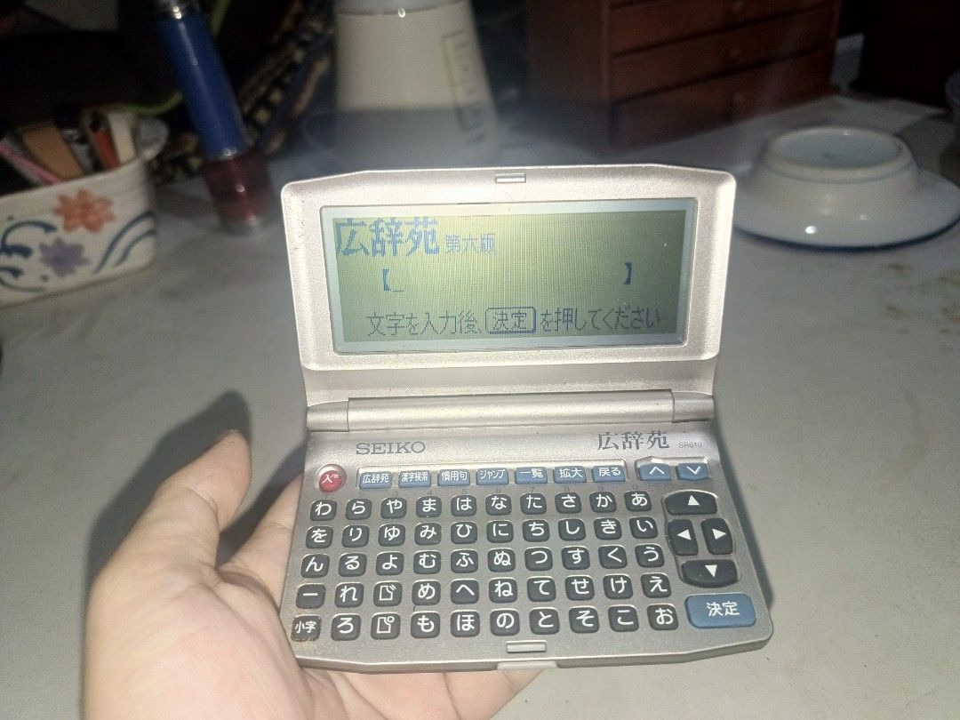 Vintage Seiko Electronic Dictionary (SR610) - Japan Surplus (Category: Office & Business Technology) located in Cebu City. Submitted by turuuru8992423 (Listing ID 1436722069, Image 1). Description: Vintage Seiko Electronic Dictionary (SR610) - Japan Surplus Description: Selling this Seiko SR610 (Kojien 6th Edition) Japanese Electronic Dictionary. This is a high-quality Japan Surplus find, perfect for collectors of vintage tech or students learnin