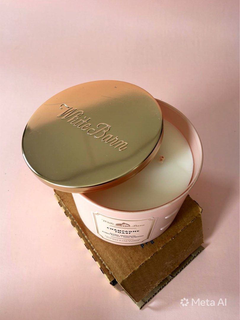 White Barn Champagne Toast 3-Wick Candle (Category: Home Fragrance) located in Antipolo. Submitted by cl026 (Listing ID 1436663607, Image 2). Description: - White Barn Champagne Toast 3-wick candle - Scent: Bubbly champagne, bright berries, and juicy tangerine - Comes in a pink container with a gold lid - Brand new, in original box.
