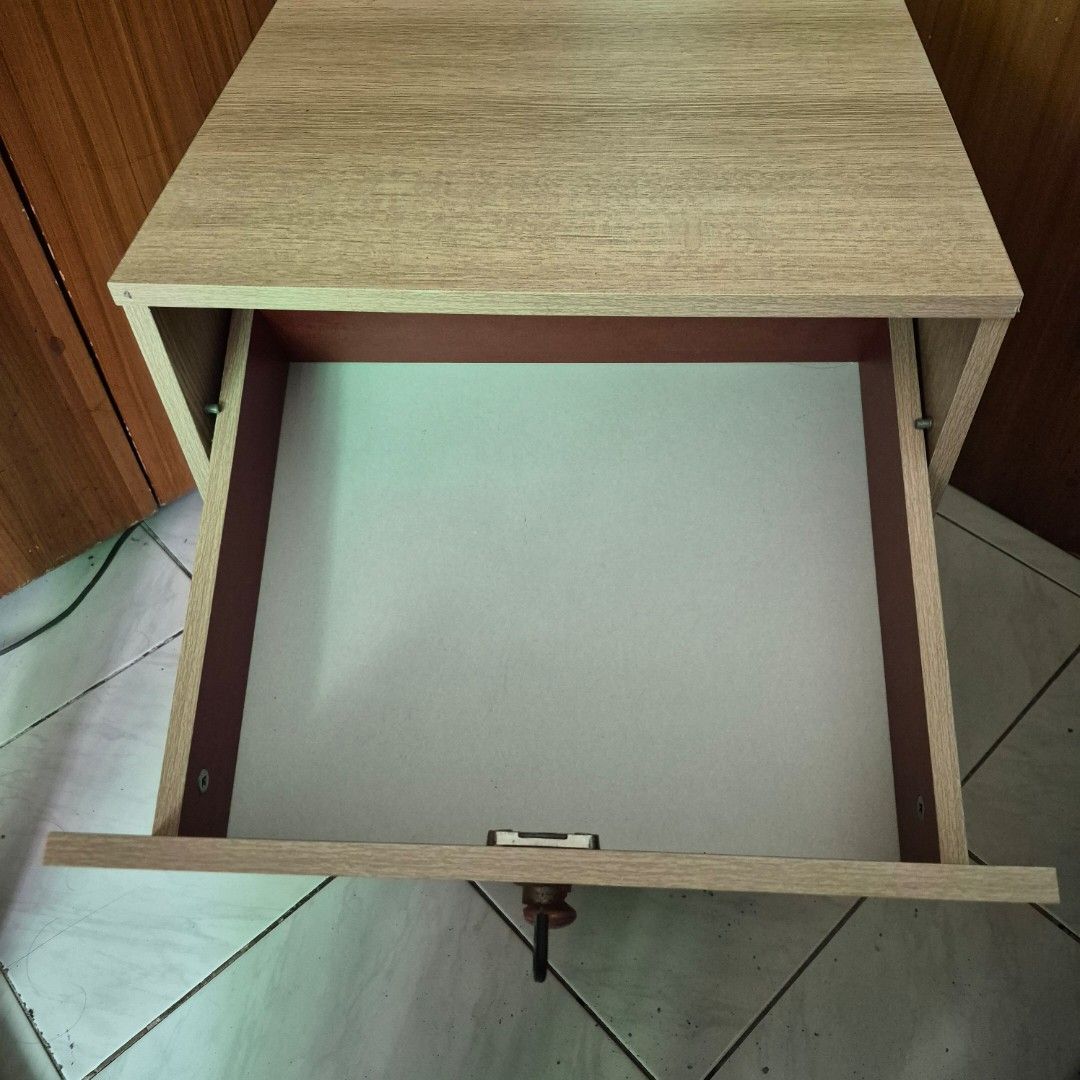 Wooden Cabinet with Drawers (Category: Shelves, Cabinets & Racks) located in Manila. Submitted by s4kuna (Listing ID 1436710794, Image 3). Description: Hi! I'm selling my wooden cabinet with three drawers and a lock. RFS: Bought a bigger cabinet Issue: Rusty lock, one key, minor stains Location: North Fairview, Quezon City MOP: Gcash, BPI, or BDO.