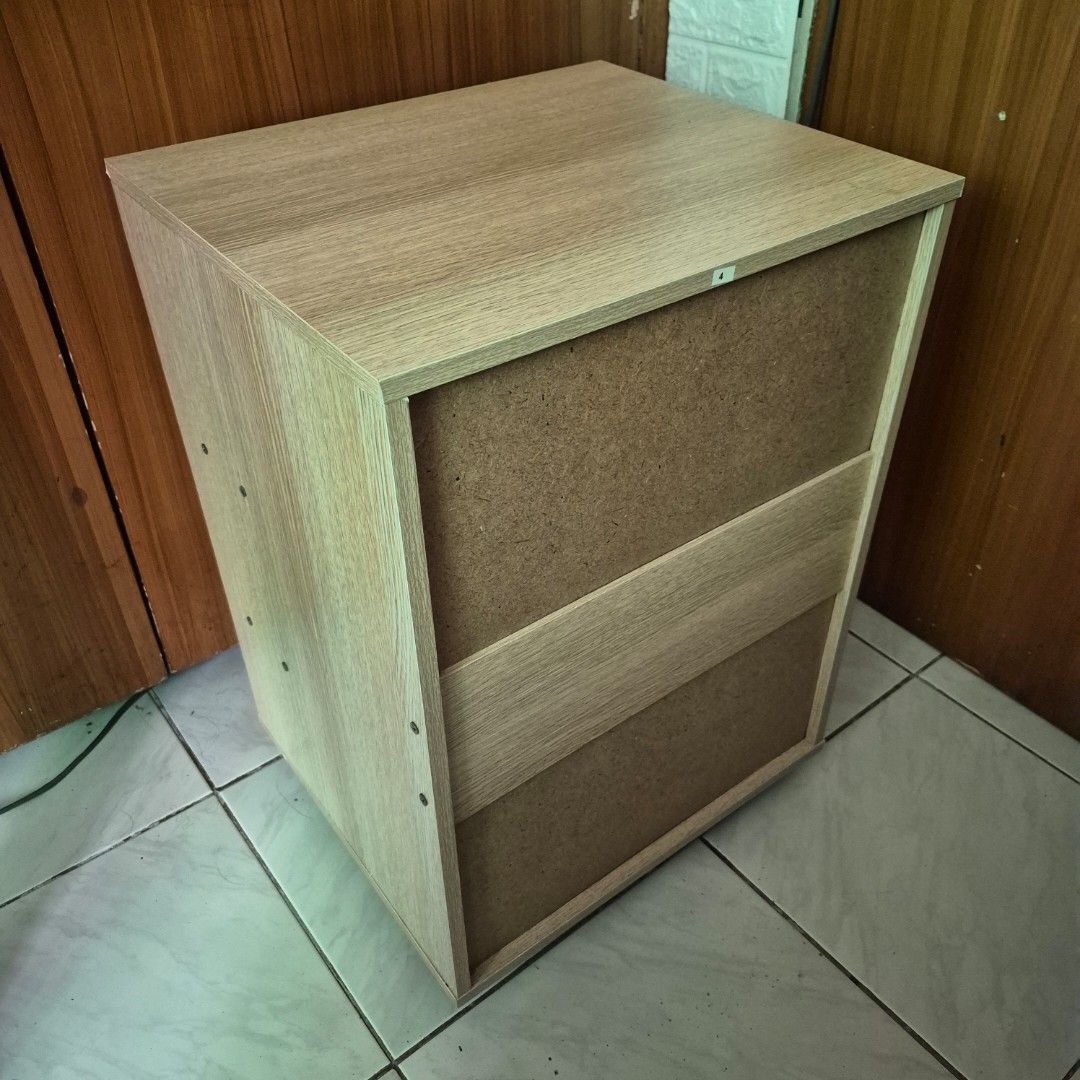 Wooden Cabinet with Drawers (Category: Shelves, Cabinets & Racks) located in Manila. Submitted by s4kuna (Listing ID 1436710794, Image 2). Description: Hi! I'm selling my wooden cabinet with three drawers and a lock. RFS: Bought a bigger cabinet Issue: Rusty lock, one key, minor stains Location: North Fairview, Quezon City MOP: Gcash, BPI, or BDO.