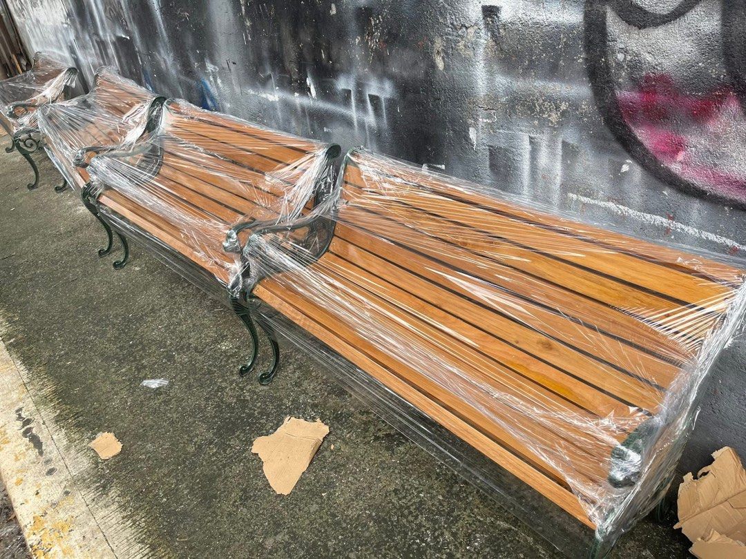 Wooden Park Bench with Cast Iron Frame (Category: Chairs) located in Manila. Submitted by lykcacamacho (Listing ID 1436659690, Image 3). Description: - Elegant wooden park bench - Cast iron frame with decorative detailing - Natural wood finish - Horizontal slats for seat and backrest - Ideal for gardens, patios, and public spaces - Multiple benches available.