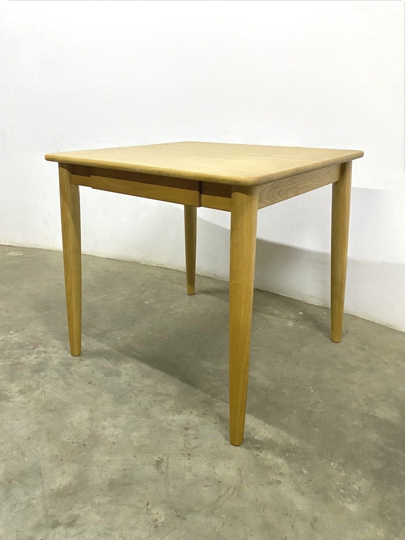 Wooden Square Table with Drawer (Category: Tables & Sets) located in Santa Rosa. Submitted by annie_annie83 (Listing ID 1436731212, Image 3). Description: - Square wooden table - Natural wood finish - Modern design - Features a drawer - Rounded edges - Suitable as side table or small dining table - Functional and stylish.