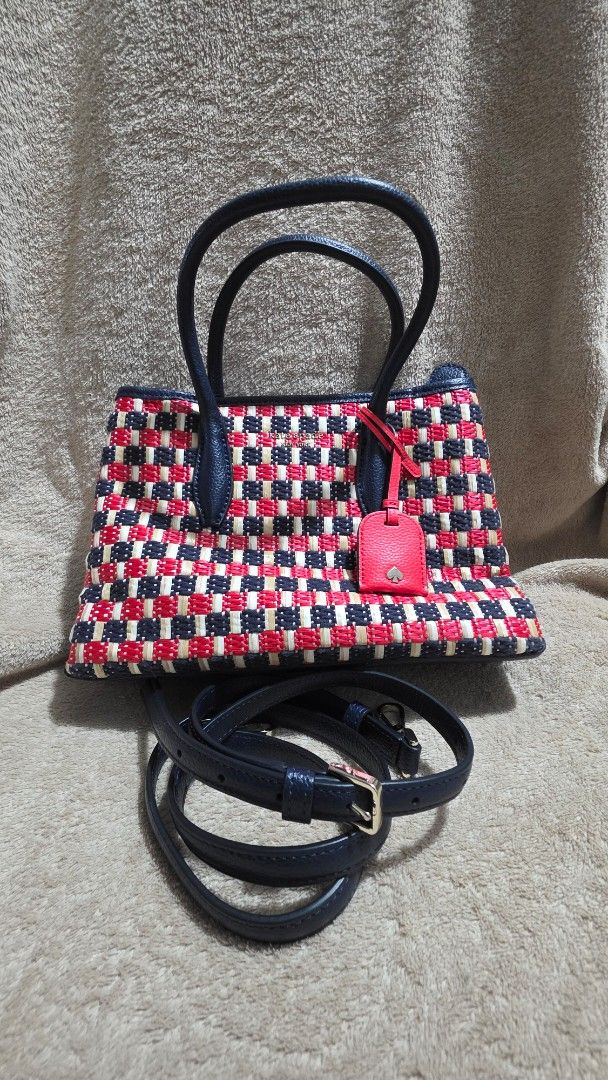 Woven Handbag with Detachable Strap (Category: Shoulder Bags) located in Mandaluyong City. Submitted by mlstuff28 (Listing ID 1436688852, Image 1). Description: - Authentic -Woven pattern in red, white, and navy blue - Navy blue leather handle - Detachable navy blue strap - Small red leather tag - Zipper closure - Navy blue leather bottom with silver studs Mop:bank transfer.