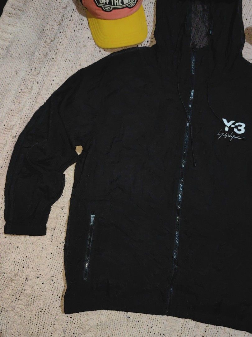 Y3 FW2019 Pacakable Sheer Hooded Jacket Black (Category: Coats, Jackets and Outerwear) located in Tuguegarao City. Submitted by ekko_bag (Listing ID 1436795802, Image 2). Description: Item Specifics: Condition - In Excellent Good condition. Thrifted from US Bale ✔️✔✔ - Yoshi x Adidas Colab - Packable, Full Zip, drawstrings - Sith Y3 Logo in front and back - See through Mesh - Hooded - No pinhole, Very good print ✔️✔✔ Dimension in inches L x W - 2