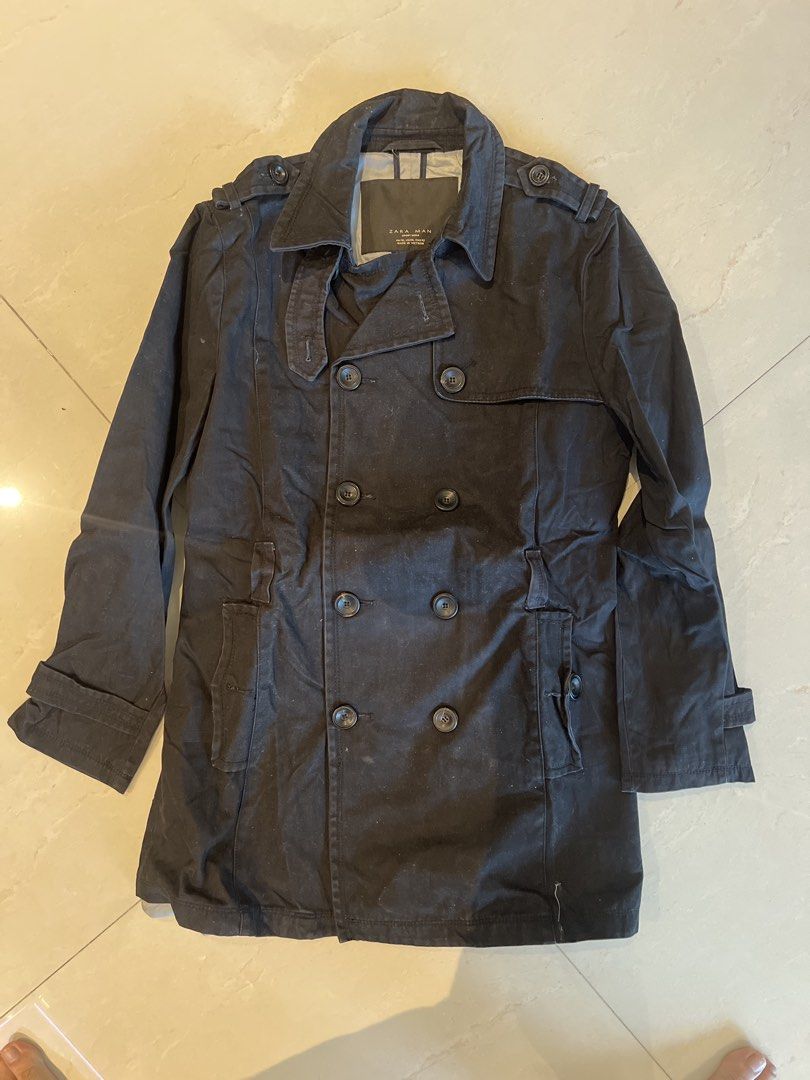 Zara Man Double-Breasted Jacket XL (Category: Coats, Jackets and Outerwear) located in Mandaluyong City. Submitted by dr.jekyl (Listing ID 1436733286, Image 2). Description: - Zara Man double-breasted jacket - Color: Black - Size: XL - Made in Vietnam - Features: Trench coat design, button closures, collared neckline, shoulder epaulettes, multiple pockets - Versatile for various occasions.