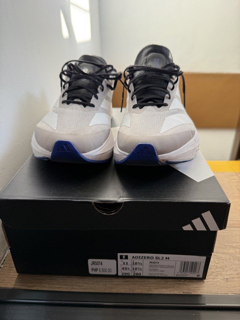 Adidas Adizero SL2 US 11 (Category: Sneakers) located in Cavite. Submitted by ercm06 (Listing ID 1436912540, Image 2). Description: FOR SALE 9/10 condition - Size: US 11 / UK 10.5 - Color: Light grey and white with black laces - With original box RFS: decluttering.
