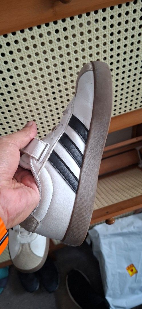 Adidas Samba Kids Shoes (Category: Babies & Kids Fashion) located in Quezon City. Submitted by alecon43 (Listing ID 1437014408, Image 3). Description: - Adidas Samba kids shoes - Black stripes - Velcro strap closure - Brown sole - Suitable for everyday wear - Classic and versatile design - Clean and ready to wear.