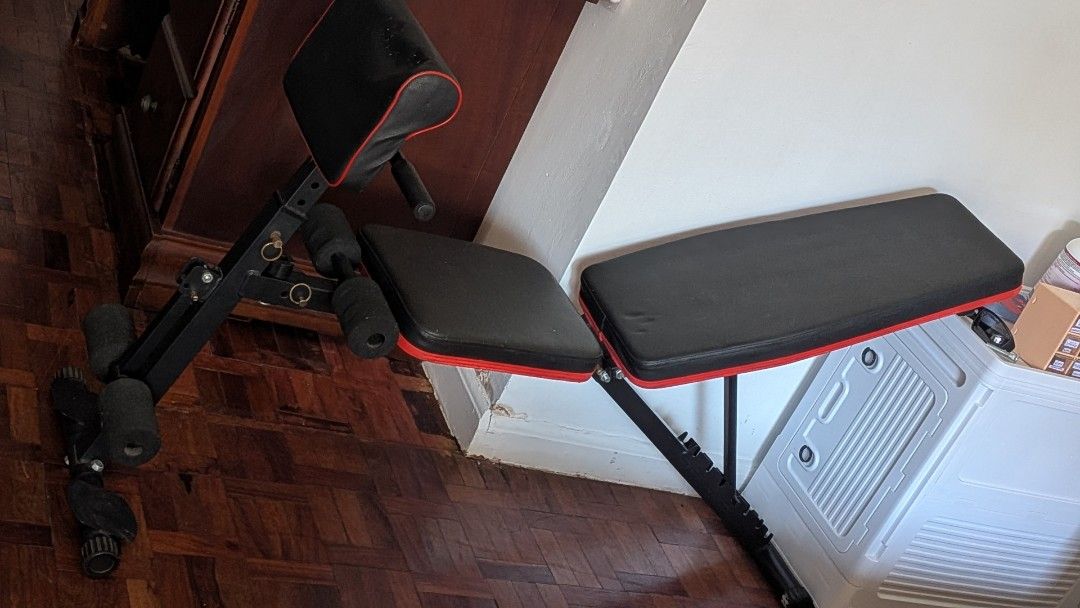 Adjustable Weight Bench (Category: Weights & Dumbbells) located in Manila. Submitted by jakeyprelovedstuff (Listing ID 1436837932, Image 2). Description: - Adjustable weight bench - Black and red accents - Padded seat and backrest - Sturdy metal frame - Multiple adjustable positions - Ideal for home gym use.