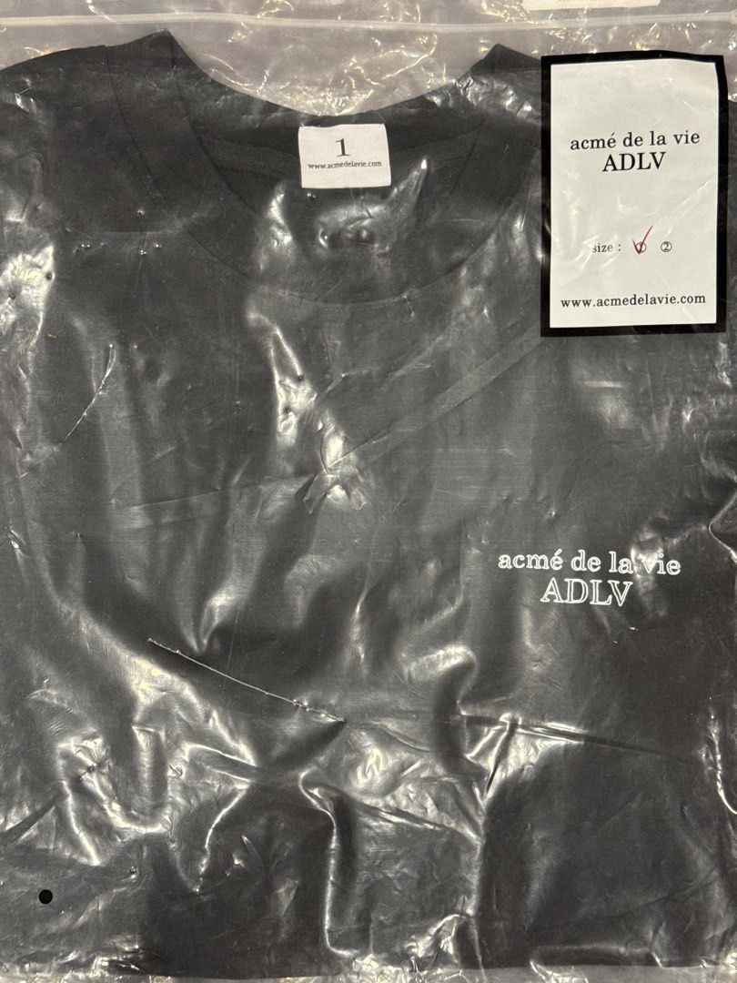 ADLV Black T-shirt (Category: Tshirts & Polo Shirts ) located in Manila. Submitted by ellis99 (Listing ID 1437008223, Image 3). Description: - ADLV T-shirt - Black tee with white front and back logo - Size 1 - Brand new, with tags and orig plastic cover - Round neck - Oversize fit (please know your size. Will give dimes if Sure Buyer) - 100% authentic Price: 1,900 only!.