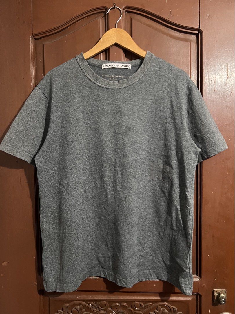 Alexander Wang Gray Shirt (Category: Luxury Apparel) located in Manila. Submitted by thriftpoint99 (Listing ID 1437005127, Image 1). Description: 22x27 Issue crack print Good condition.