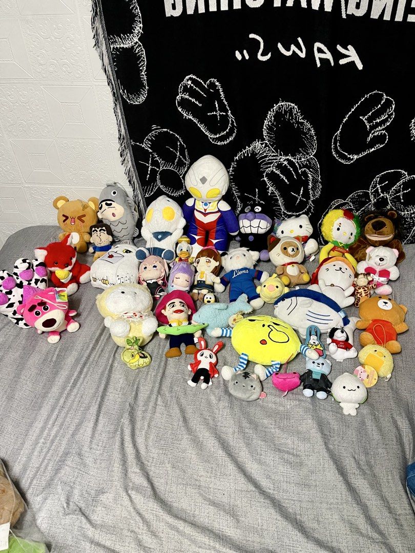 Assorted Plush Toys - Ultraman, Hello Kitty, and More! (Category: Plushies & Soft Toys) located in Quezon City. Submitted by listless32 (Listing ID 1436938874, Image 2). Description: Plush toy collection featuring Ultraman, Kitty, and other characters. Includes animal plushies. Various sizes and styles available. Great for gifts or collectors..