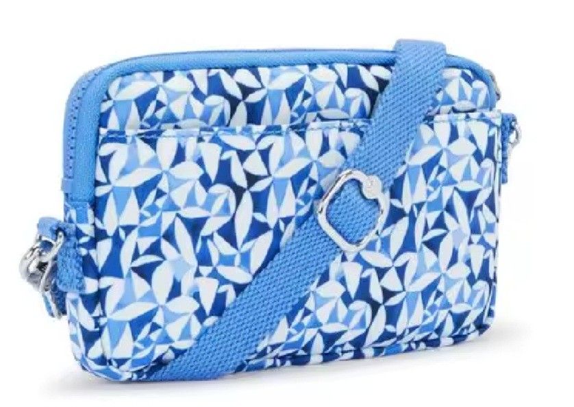 Authentic Kipling Limmo Sling Bag Wallet (Category: Wallets & Card holders) located in Davao. Submitted by jilly07 (Listing ID 1436836094, Image 3). Description: The Kipling Limmo is a small crossbody bag designed for light everyday use. It is known for being compact, slim, and lightweight, while still having enough compartments to organize essentials like a phone, wallet, cards, keys, and small personal items. It can also function as a mini wall