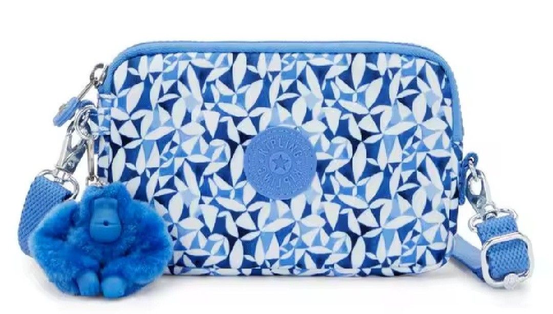 Authentic Kipling Limmo Sling Bag Wallet (Category: Wallets & Card holders) located in Davao. Submitted by jilly07 (Listing ID 1436836094, Image 1). Description: The Kipling Limmo is a small crossbody bag designed for light everyday use. It is known for being compact, slim, and lightweight, while still having enough compartments to organize essentials like a phone, wallet, cards, keys, and small personal items. It can also function as a mini wall