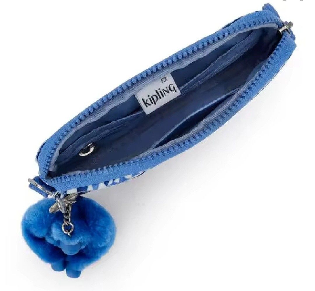 Authentic Kipling Limmo Sling Bag Wallet (Category: Wallets & Card holders) located in Davao. Submitted by jilly07 (Listing ID 1436836094, Image 2). Description: The Kipling Limmo is a small crossbody bag designed for light everyday use. It is known for being compact, slim, and lightweight, while still having enough compartments to organize essentials like a phone, wallet, cards, keys, and small personal items. It can also function as a mini wall