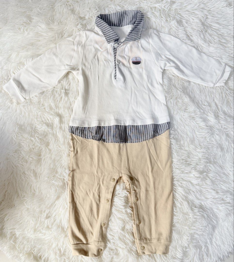 Baby Boy Nautical Romper 9-12M (Category: Babies & Kids Fashion) located in Bulacan. Submitted by ta.klowset (Listing ID 1436870378, Image 1). Description: - Adorable baby boy romper - Nautical design - White top with striped collar and boat emblem - Light tan bottom - Long sleeves - Button closure for easy wear - Made of soft, comfortable material Used once, with washable stain - check on 2nd pic.