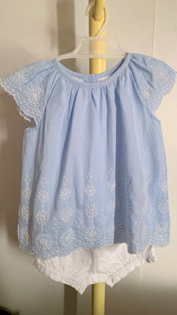 Baby Girl Blue Embroidered Top and Shorts Set (Category: Babies & Kids Fashion) located in Quezon City. Submitted by warmrabbit_414908 (Listing ID 1436870816, Image 1). Description: - Adorable baby girl outfit - Light blue top with white embroidery - Top features a round neckline and button closure - Matching white shorts with elastic waistband - Comfortable fit - Perfect for warm weather or special occasions.