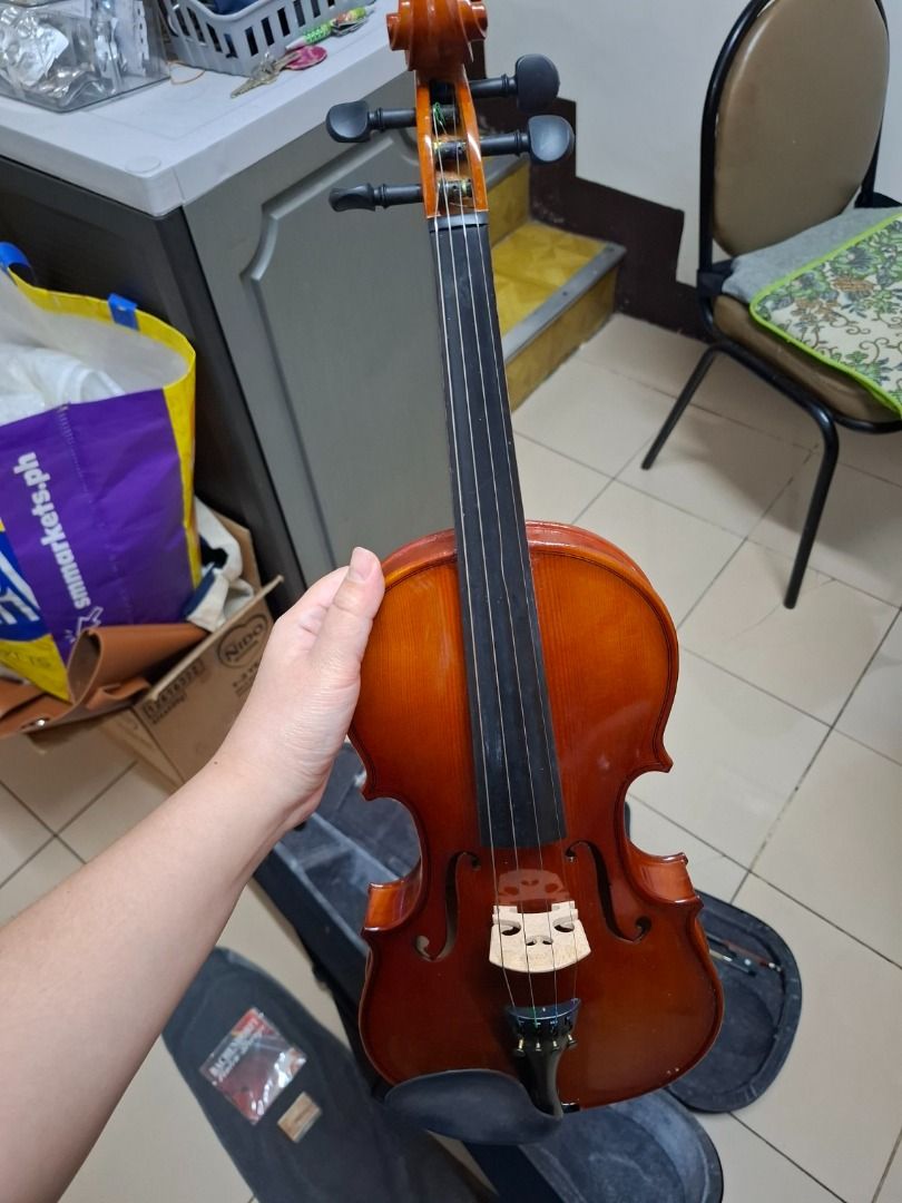 Bachendorff Violin 4/4 Complete Set (with Bow, Case, Rosin + Extra Strings) (Category: Musical Instruments) located in Quezon City. Submitted by cmc32 (Listing ID 1436915775, Image 3). Description: Selling my Bachendorff 4/4 Violin (Full Size) 🎻 ✔ Lightly used - only for around 10 violin lessons ✔ Well taken care of ✔ No visible damages ✔ In very good condition Inclusions: ✔ Violin (4/4 full size) ✔ Bow ✔ Hard case ✔ Rosin ✔ FREE extra Bachendor