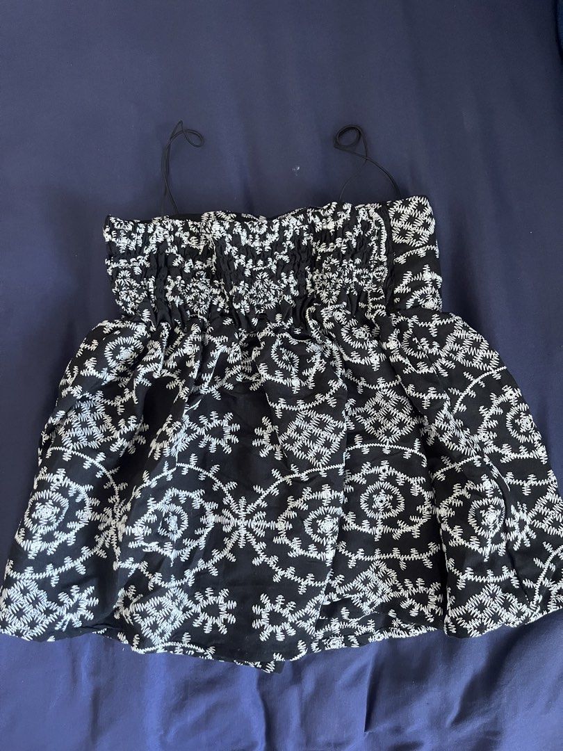 Bangkok Embroidered Black Top with Spaghetti Straps (Category: Sleeveless) located in Paranaque City. Submitted by chin.declutters (Listing ID 1436987589, Image 2). Description: - Black top - White embroidery - Spaghetti straps -Padded -Fits Small to Semi Large .