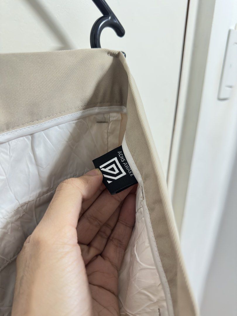Beige Pants (Category: Jeans) located in Manila. Submitted by hutfris (Listing ID 1436905288, Image 2). Description: - ACHS AWAKE beige pants - Straight leg style - Features button closure - Includes side pockets - Tag visible in photos Size 34 Small Fit Can fit to 32 USA Men.