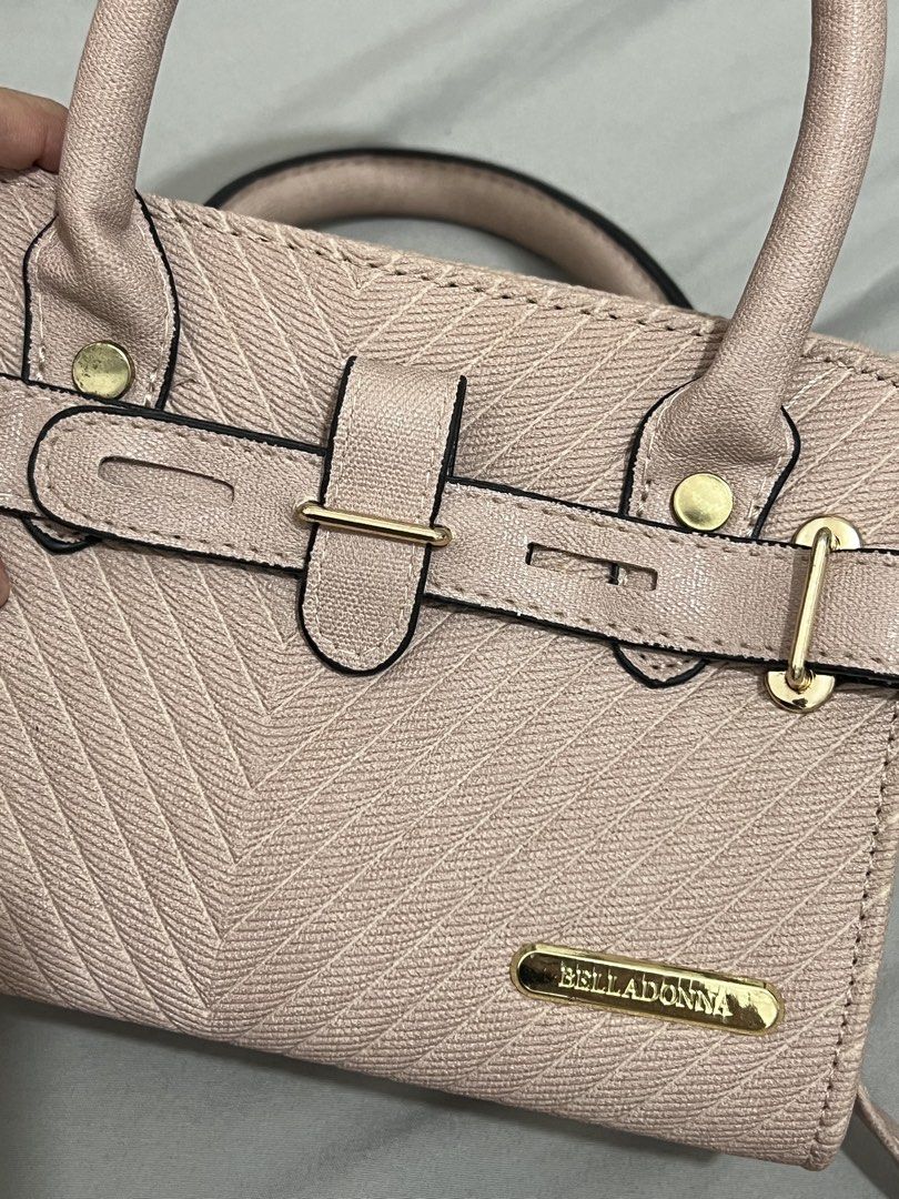 Belladonna Pink Handbag (Category: Shoulder Bags) located in Quezon City. Submitted by riamgt (Listing ID 1436984080, Image 2). Description: - Pink Belladonna handbag - Textured exterior - Top handle and detachable shoulder strap - Never used, but was sitting in my closet for a while.