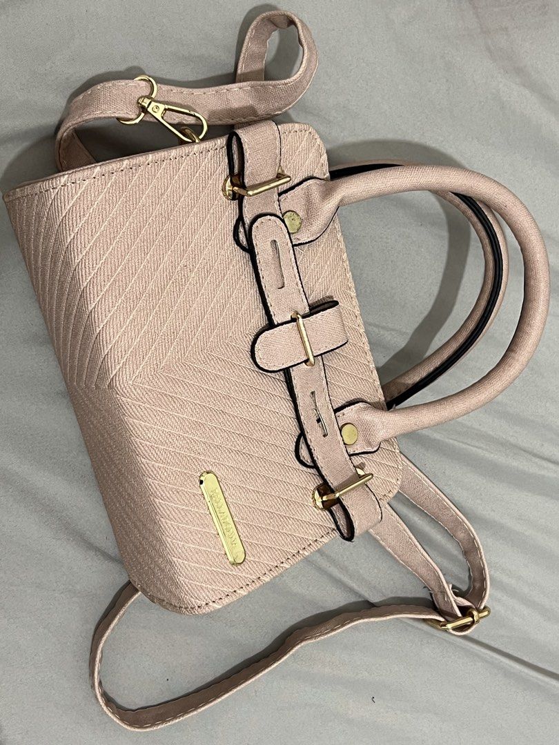 Belladonna Pink Handbag (Category: Shoulder Bags) located in Quezon City. Submitted by riamgt (Listing ID 1436984080, Image 1). Description: - Pink Belladonna handbag - Textured exterior - Top handle and detachable shoulder strap - Never used, but was sitting in my closet for a while.