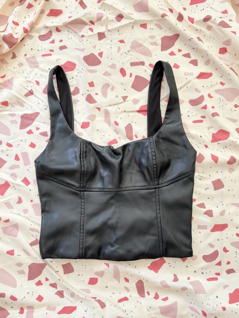Bershka Faux Leather Top (Category: Sleeveless) located in Bulacan. Submitted by ichom7895 (Listing ID 1436887169, Image 1). Description: .