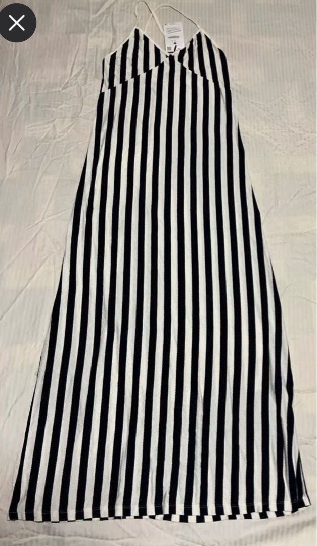 Berska Striped Maxi Dress (Category: Dresses) located in Makati City. Submitted by boldturtle-8720 (Listing ID 1436876567, Image 1). Description: Maxi knit dress Spaghetti strap style Small L 49 in / Pit to pit 12.5 in Brand new with tag Original price Php 1195.