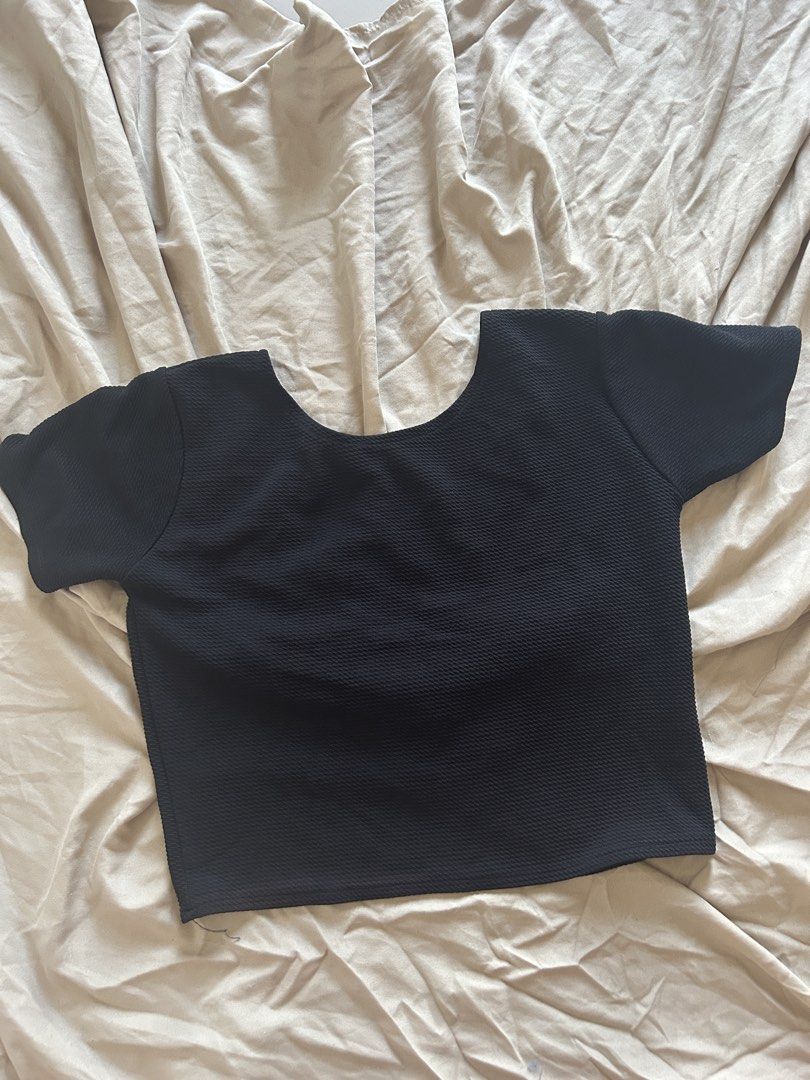 Black Crop Top (Category: Others Tops) located in Binan City. Submitted by missrandomthings (Listing ID 1436854159, Image 1). Description: - Black crop top - Scoop back design - Short sleeves - Textured fabric - Solid black color - Perfect for everyday wear.