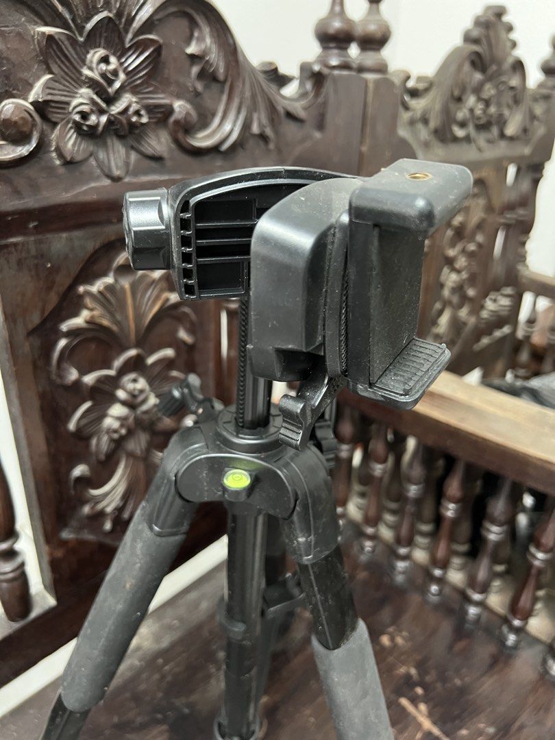 Black Tripod with Phone Holder (Category: Tripods & Monopods) located in Quezon City. Submitted by itsmecece (Listing ID 1436858179, Image 2). Description: Black tripod with phone holder and bubble level. Adjustable legs for stability. Perfect for photos and videos with your smartphone..