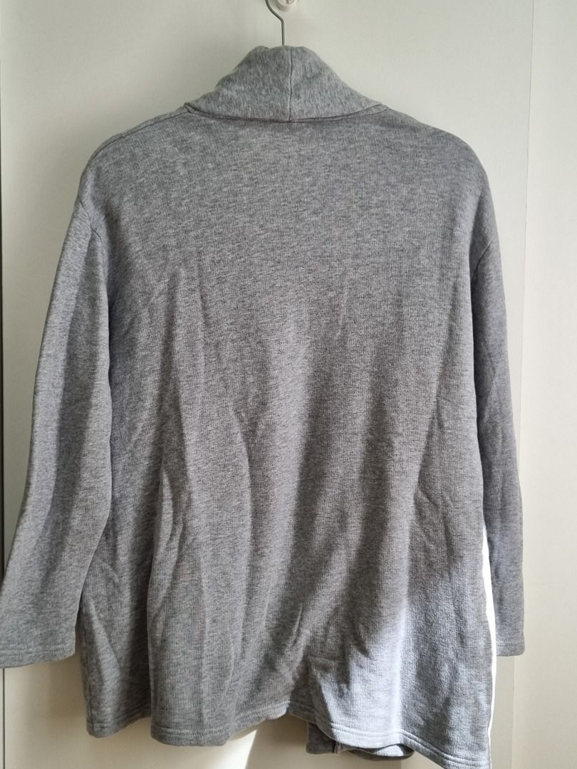 Champion Open-Front Cardigan (Gray) (Category: Coats, Jackets and Outerwear) located in Dasmarinas. Submitted by grrflm (Listing ID 1436908960, Image 2). Description: - Dimensions: (Note: Flat lay, allow for 1 to 2cm allowance) Shoulder width: 52 cm (Measured across the garment from shoulder tip to shoulder tip) Sleeve length: 50 cm (Measured in a straight line from the shoulder/armhole seam to the edge of the sleeve hem) Body width: 70 cm (From 