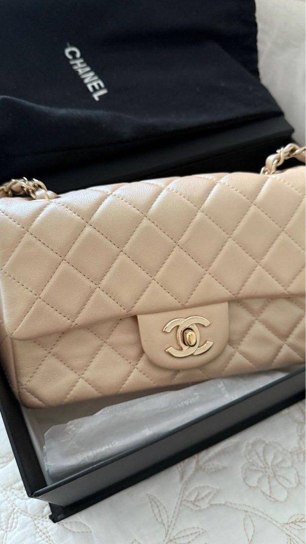 Chanel mini rectangular (Category: Bags & Wallets) located in Ampang. Submitted by banyakbetulbaju (Listing ID 1436998446, Image 2). Description: - Chanel mini rectangular - iridescent beige color - Iconic quilted design - Signature CC turn-lock closure - Gold chain strap - Includes dust bag and box - A timeless and elegant piece.