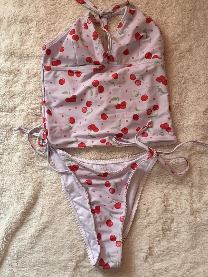 Cherry Print Halter Bikini Set (Category: Bikinis & Swimsuits) located in Quezon City. Submitted by jenlo_declutter (Listing ID 1436900477, Image 1). Description: SHEIN Tankini Multicolor Cherry Print Halter Style Size: XS Other details Looks better in personal Gray color Adjustable and breathable Perfect for summer wear Once used only for beach trip No damage (I only removed the bottom’s hygiene sticker after using it) Removed the tag after laun