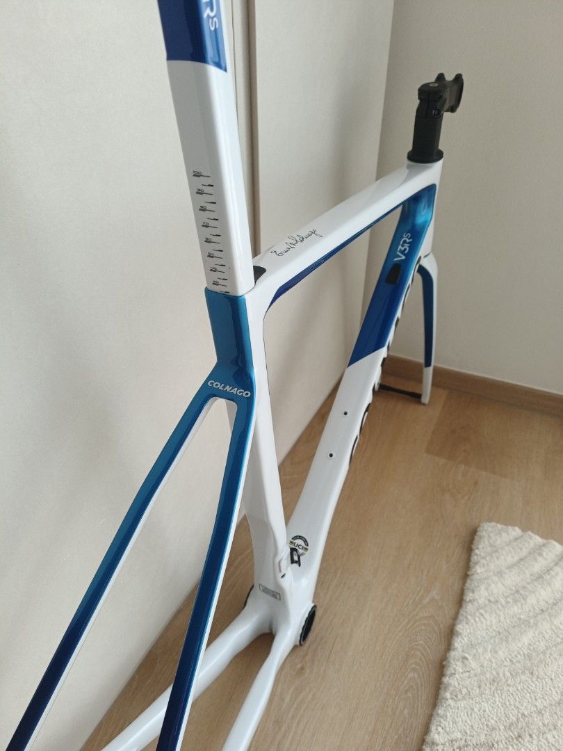 Rare Special Sale!! Colnago V3Rs white frameset New and Unbuilt Size 52s (Includes handlebar 😄 ) (Category: Bicycles) located in Singapore. Submitted by hironodreams (Listing ID 1435649013, Image 3). Description: **The Colnago V3Rs is a top-tier, lightweight carbon monocoque road racing bike designed for performance, offering a stiff yet comfortable ride. Released around 2020 and notable as a Tour de France winner, it features dropped seatstays,