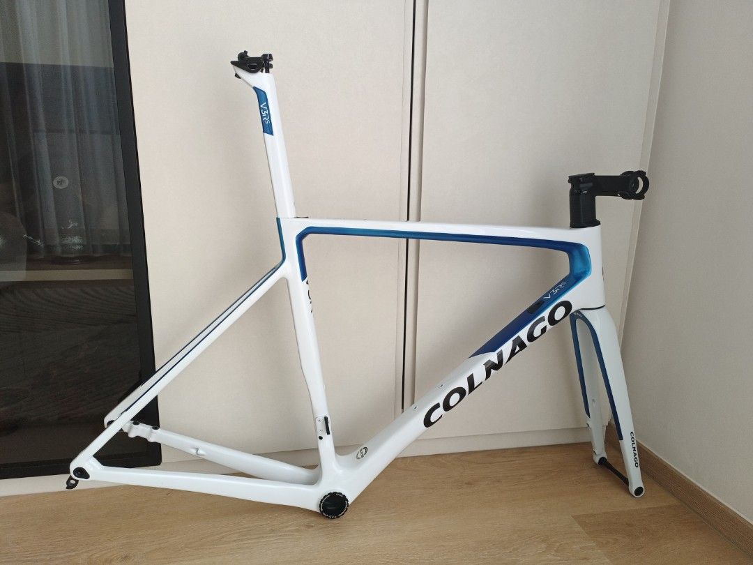 Rare Special Sale!! Colnago V3Rs white frameset New and Unbuilt Size 52s (Includes handlebar 😄 ) (Category: Bicycles) located in Singapore. Submitted by hironodreams (Listing ID 1435649013, Image 2). Description: **The Colnago V3Rs is a top-tier, lightweight carbon monocoque road racing bike designed for performance, offering a stiff yet comfortable ride. Released around 2020 and notable as a Tour de France winner, it features dropped seatstays,