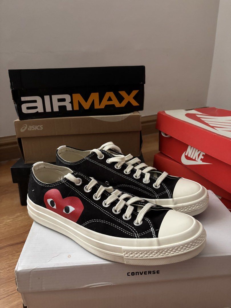 Converse Play Comme des Garcons Low Top Black (Category: Sneakers) located in Quezon City. Submitted by dan.bam (Listing ID 1436920318, Image 1). Description: - Converse Play Comme des Garcons low top sneakers - Color: Black - Iconic heart logo on the side - Size: US Men's 8.5 / US Women's 10.5 - White laces and sole - Comes with box NOT AUTHHH - WHAT YOU SEE IS WHAT YOU GET - BUY AT YOUR OWN RISK Location: QC Can do same day delivery through gra