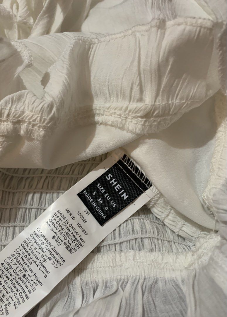 Cream Puff Sleeve Crop Top (Category: Blouses) located in Naga. Submitted by cydie.finds (Listing ID 1437009148, Image 3). Description: SHEIN top for sale 🤍 * Square neckline * Long puff sleeves * Ruffled hem * Tie detail at bust * Shirred back panel * Lightweight textured fabric ✨ Only worn once, still in excellent condition Bought for ₱599, selling for ₱450 Price can still be discussed .